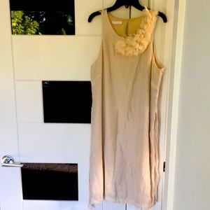 Beige dress with flower details on neck line